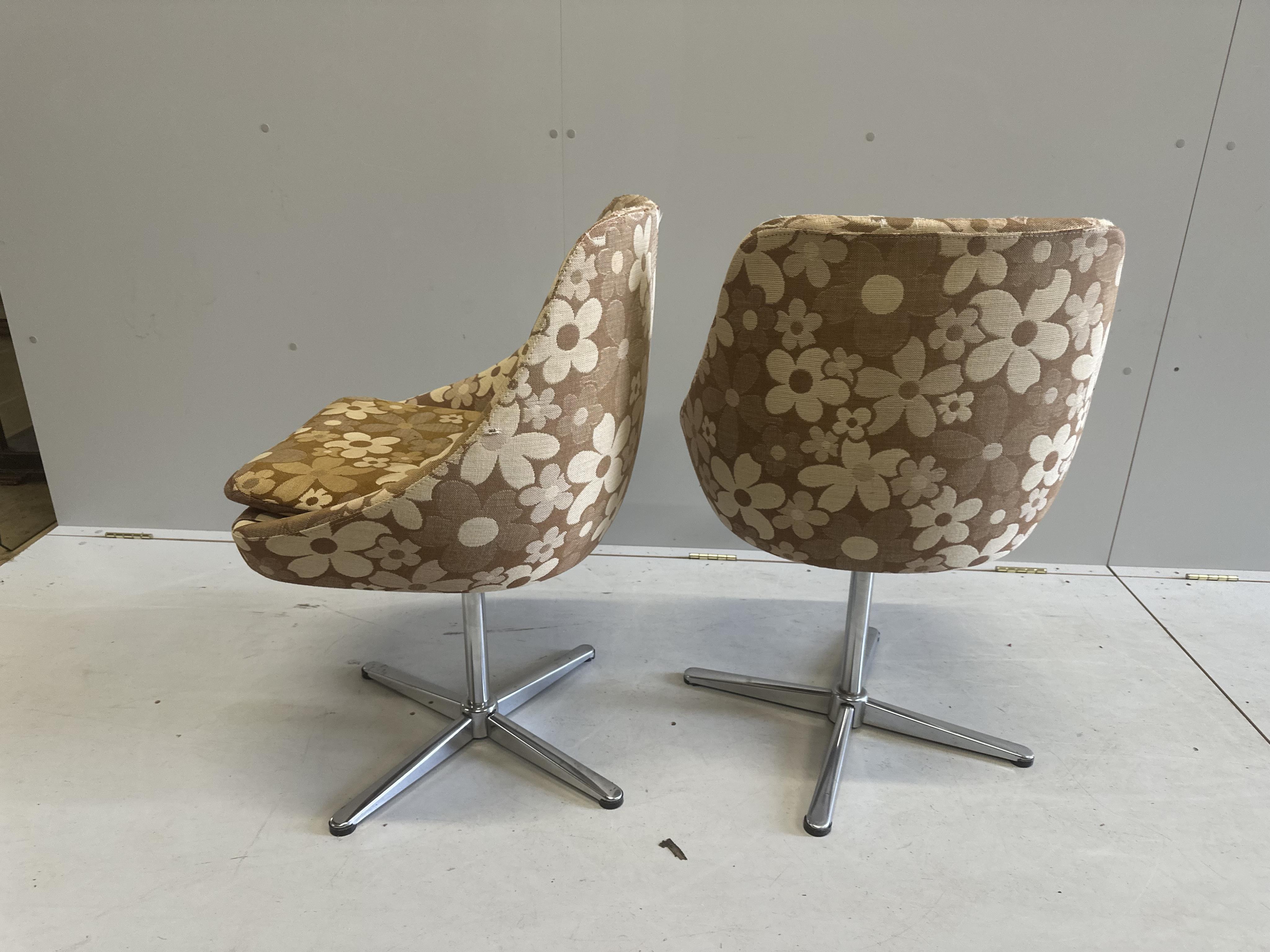 A circular Tulip table, diameter 152cm, height 75cm, and six swivel chairs. Condition - fair to good